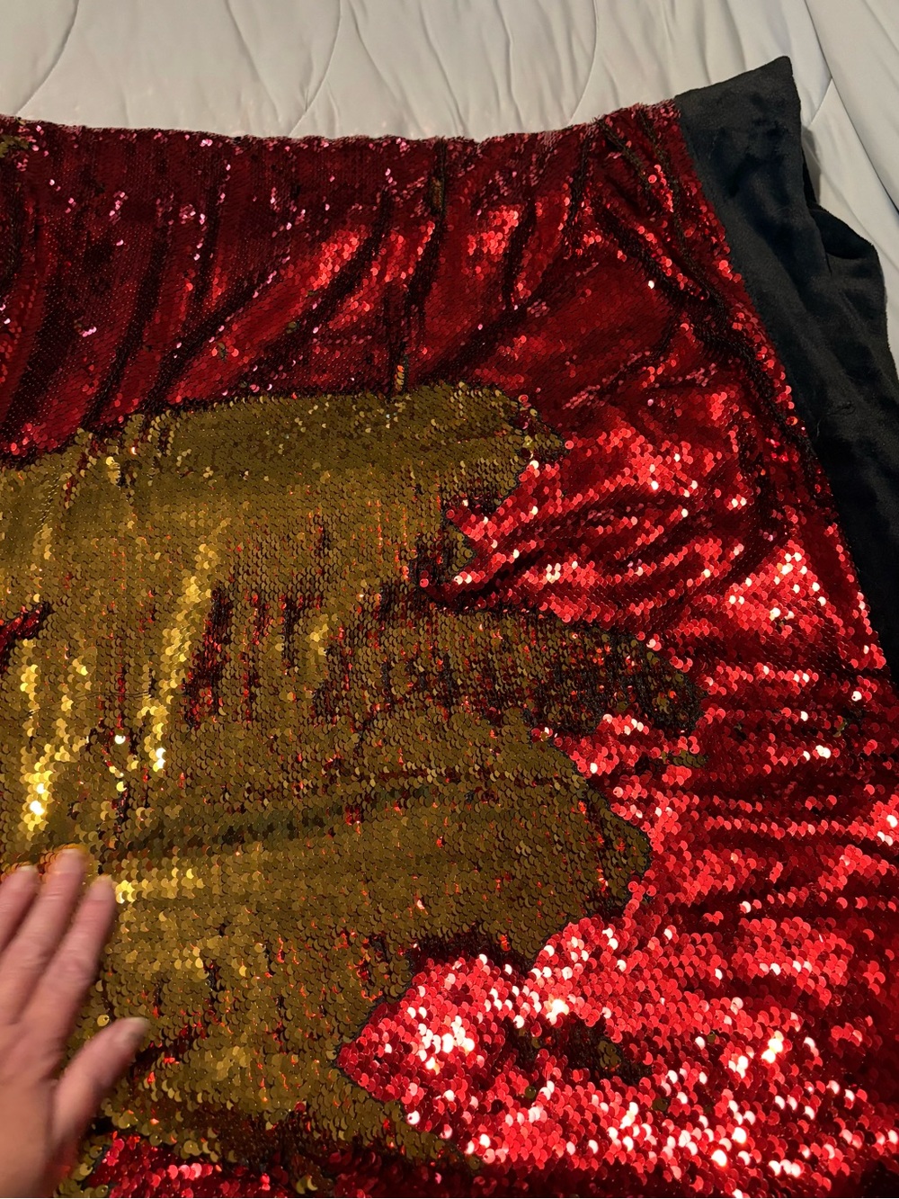 Red and gold reversible sequin fabric blanket